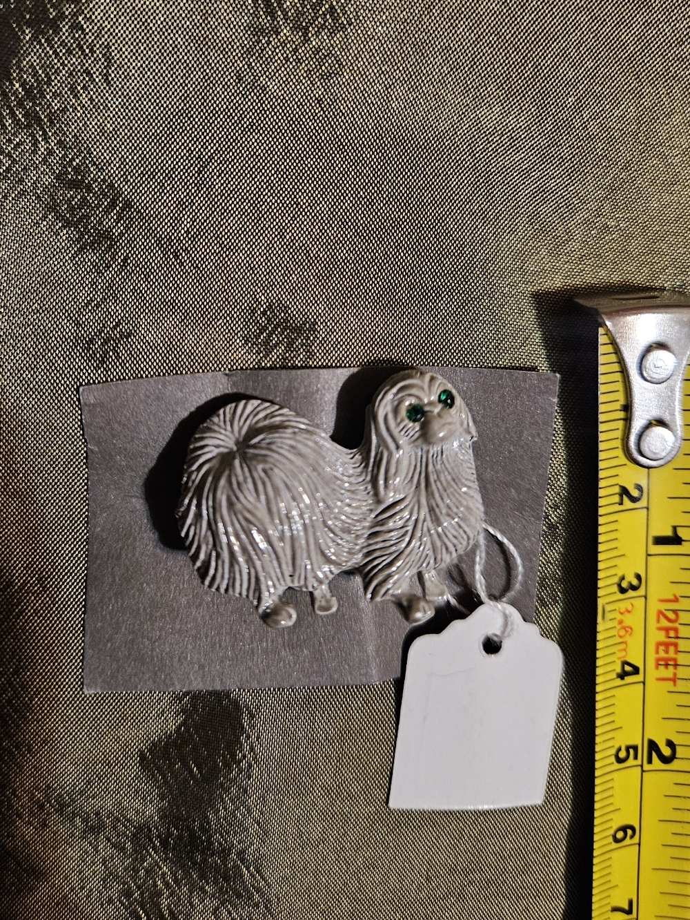 Hold. Vintage Brooch Shaggy Dog Brooch Pin with Green Eyes